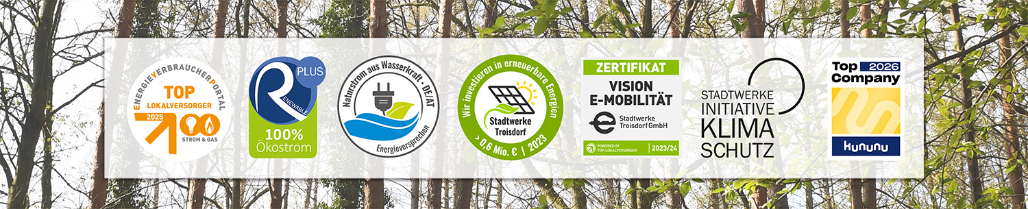 Siegel auf weißer Fläche vor Bäumen